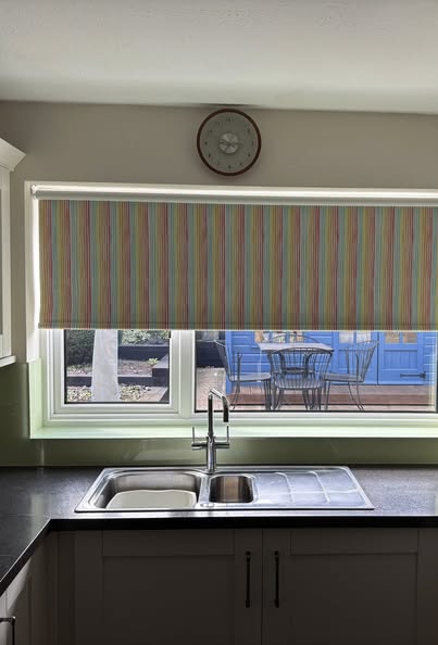 Striped roller blind in a kitchen installation, Winchcombe Gloucestershire”